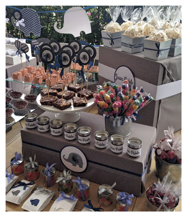 Mesa de dulces Baby Shower Cereal, paletas, palomitas, brownies, gomitas